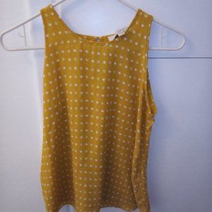 Yellow tank with white polka dots